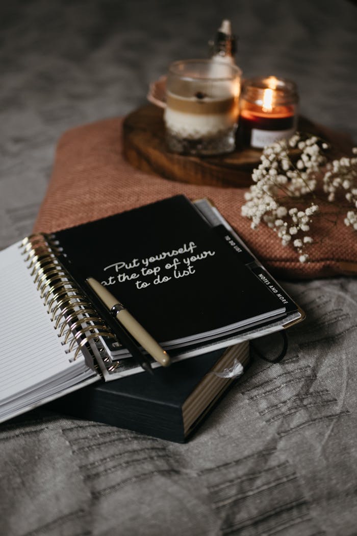 Black and White Book on Brown Textile